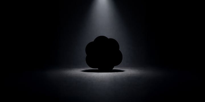 A silhouette of a ChatGPT logo